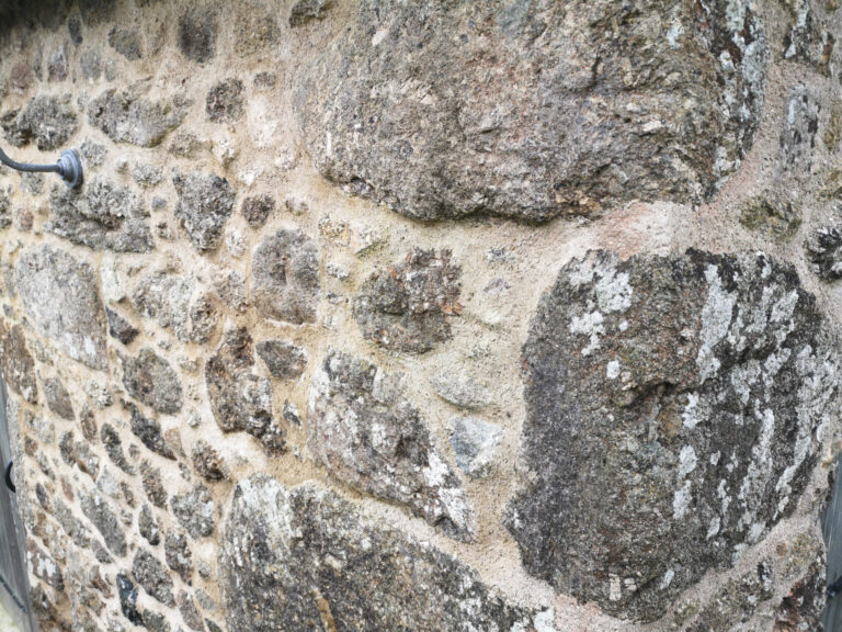 Repointing rubble granite wall with traditional lime mortar